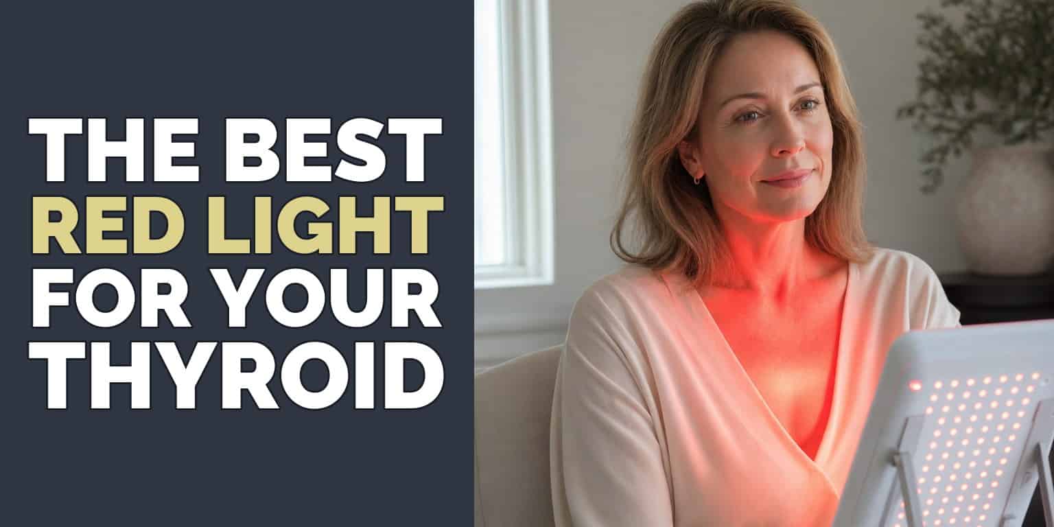 Woman sitting in front of a red light therapy panel with the light falling on her neck, used for thyroid support